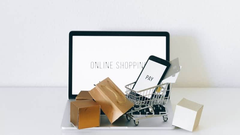 Cover showing a laptop labeled online shopping with a mini cart, packages, and payment cards for cart abandonment